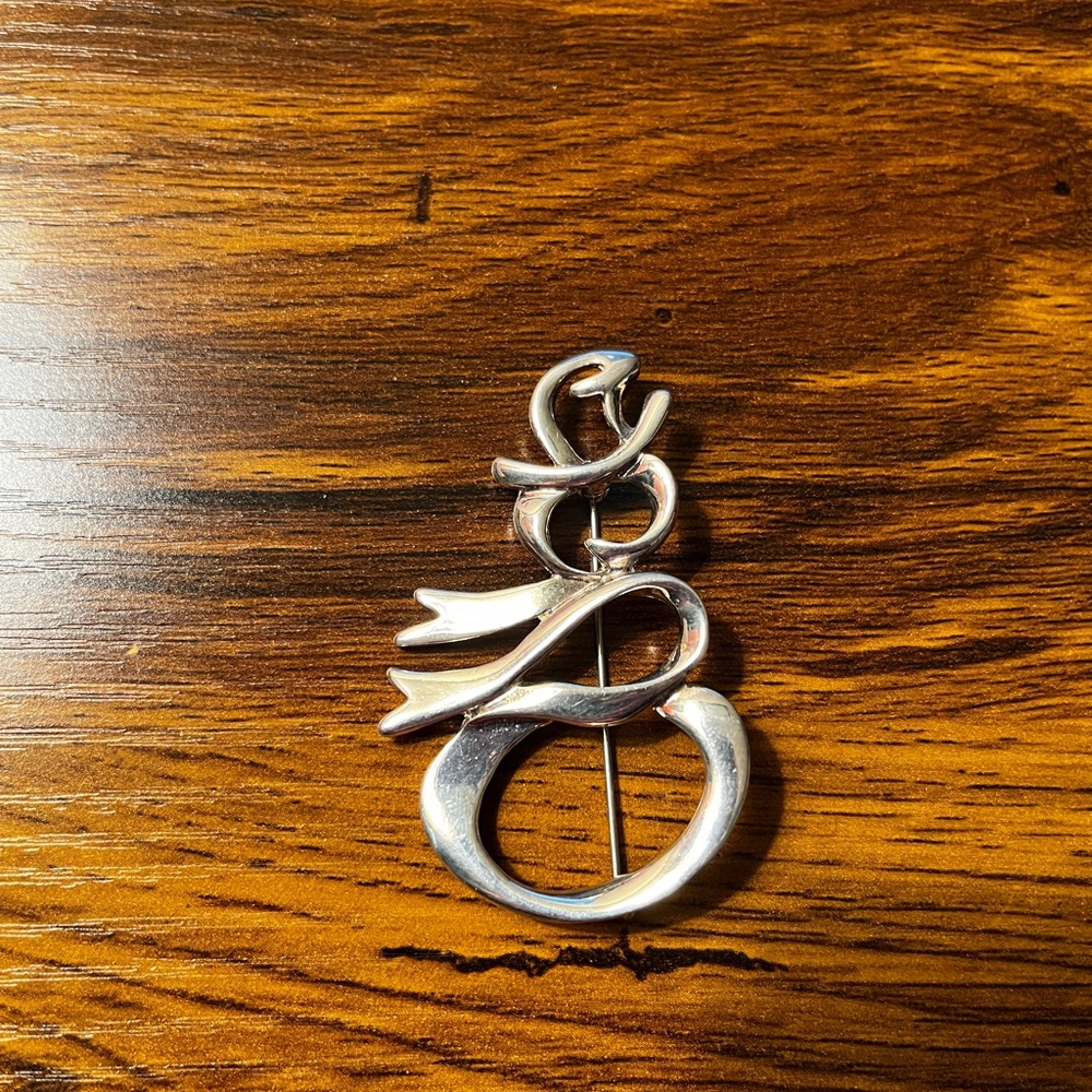 Silver snowman pin